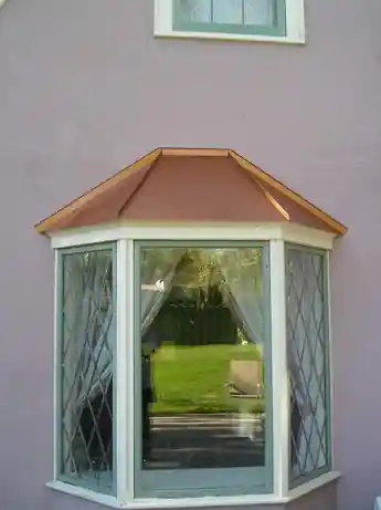 Copper roof over a bay window